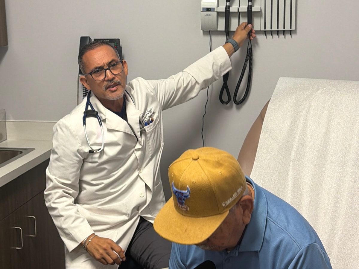Dr. Jose A. Marin examining a patient at Transmountain Primary Care in El Paso